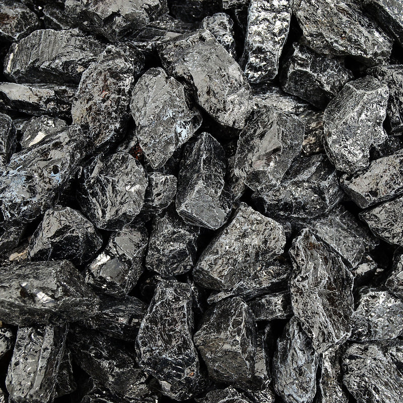 Several rough black tourmaline nugget crystals