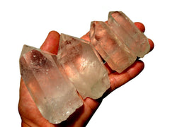Four clear quartz raw points 40mm-100mm