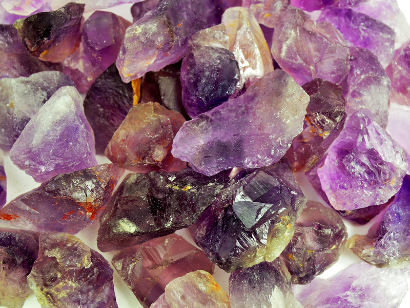 Several raw purple amethyst stones 30mm-40mm 