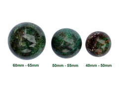 Three chrysocolla crystal spheres 40mm-65mm on white background