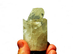 One crystal quartz cluster cylinder 60mm on hand with white background