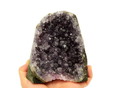 One druzy amethyst cut base 118mm on hand with white background