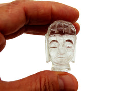 One mini clear quartz buddha head sculpture 40mm on hand with white background