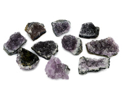 Some natural druzy amethyst crystals 50mm-70mm on hand with white background