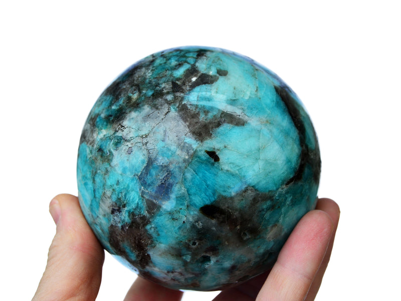 Amazonite sphere 75mm on hand with white background