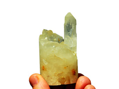 One druzy crystal quartz cylinder 60mm on hand with white background