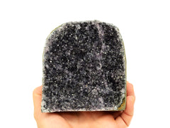 One lavender druzy amethyst cut base 100mm on hand with white background