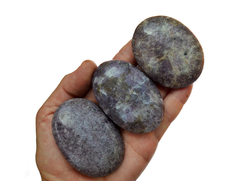 Three  lepidolite palm stones 55mm-70mm on hand with white background