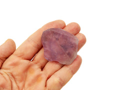 One purple amethyst 40mm on hand with white background