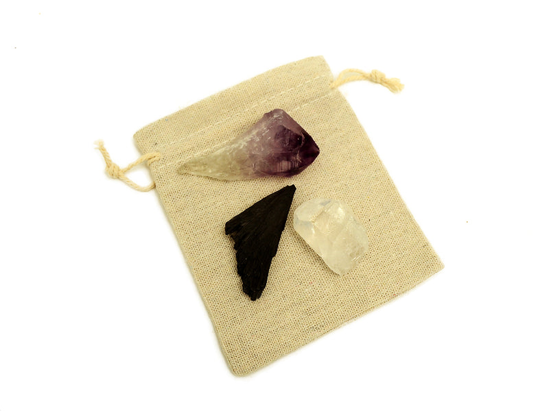 One raw amethyst point, rough black kyanite and raw clear quartz point 30mm-40mm on small jute bag
