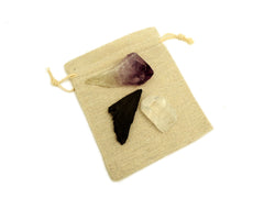 One raw amethyst point, rough black kyanite and raw clear quartz point 30mm-40mm on small jute bag