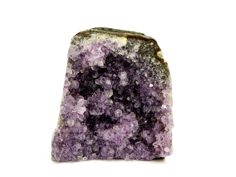 One druzy amethyst cut base 98mm on hand with white background