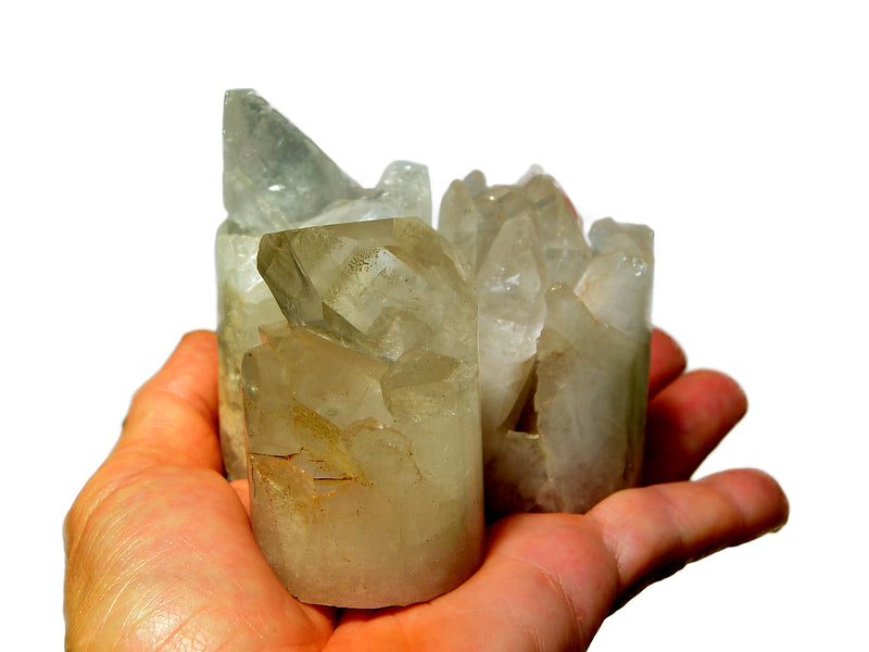 Three druzy crystal quartz cylinders 55mm on hand with white background