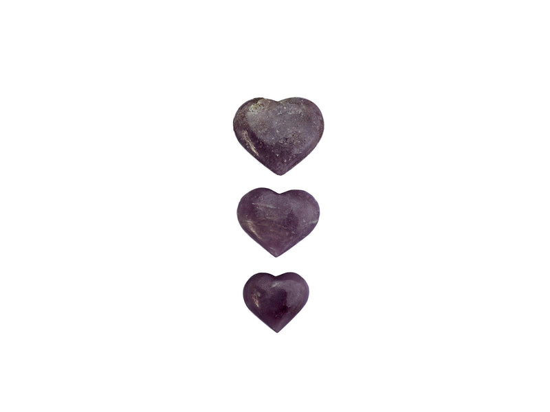 Three lepidolite crystal hearts 25mm-45mm on white background