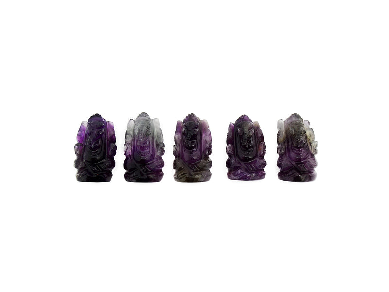 Five mini purple amethyst ganesha figures 35mm on white background