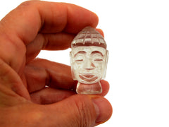 One mini clear quartz buddha head sculpture 40mm on hand with white background