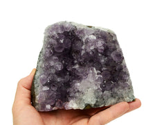 One druzy amethyst cut base 100mm on hand with white background