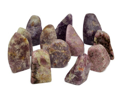 Some purple lepidolite free form crystals 70mm-110mm on white background