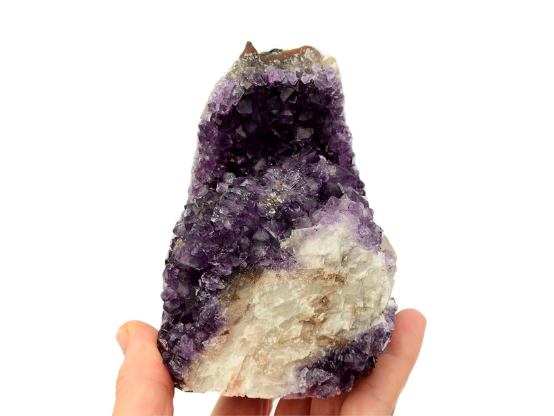 One large purple druzy amethyst cut base 115mm on hand with white background