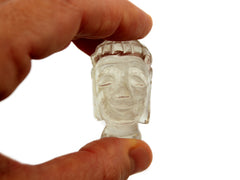 One mini clear quartz buddha head sculpture 45mm on hand with white background