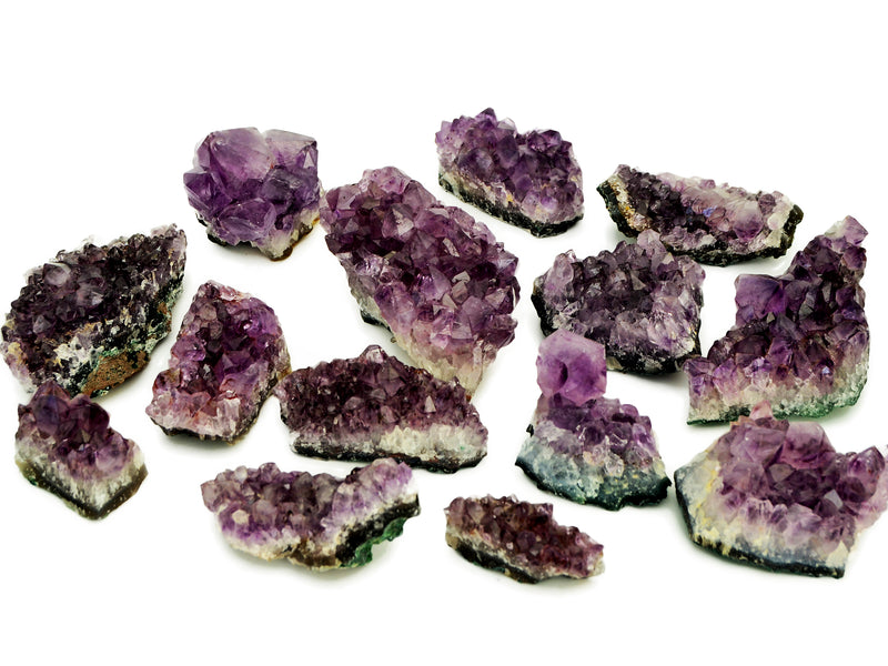 Several brazilian druzy amethyst crystals 50mm-110mm on white background