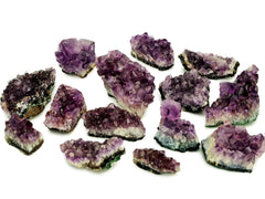 Several brazilian druzy amethyst crystals 50mm-110mm on white background