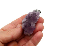 Druzy purple amethyst stone 50mm on hand with white background