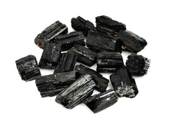 Some rough black tourmaline crystals 25mm-60mm on white background