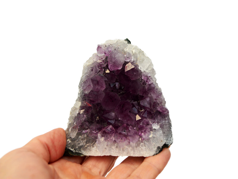 One druzy amethyst cut base 6mm on hand with white background