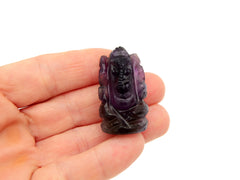 One mini purple amethyst ganesha figure 35mm on hand with white background