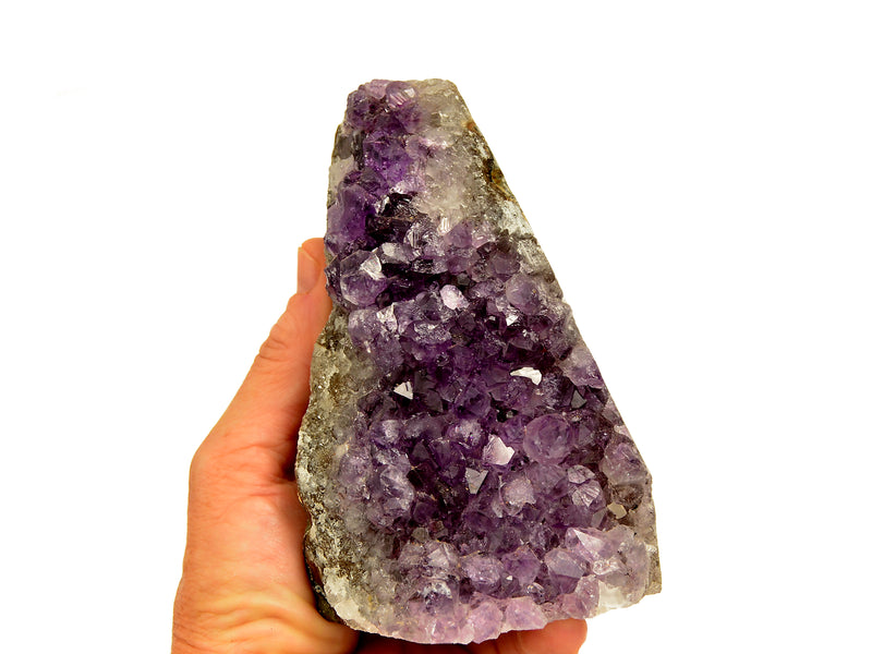 One amethyst druzy cut base 120m on hand with white background