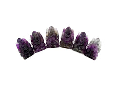 Six mini amethyst ganesha esculptures 35mm on white background