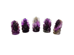 Five mini amethyst ganesha esculptures 35mm on white background