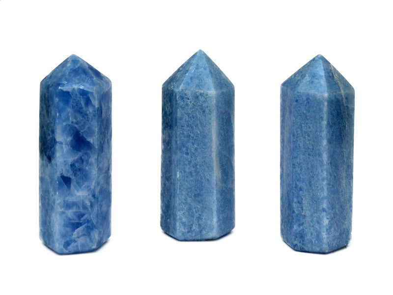 Three arge blue calcite crystal points 120mm-125mm on white background