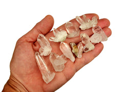 Some mini clear quartz druzies 30mm on hand with white background