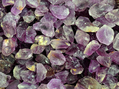 Several raw amethyst stones 30mm-40mm 