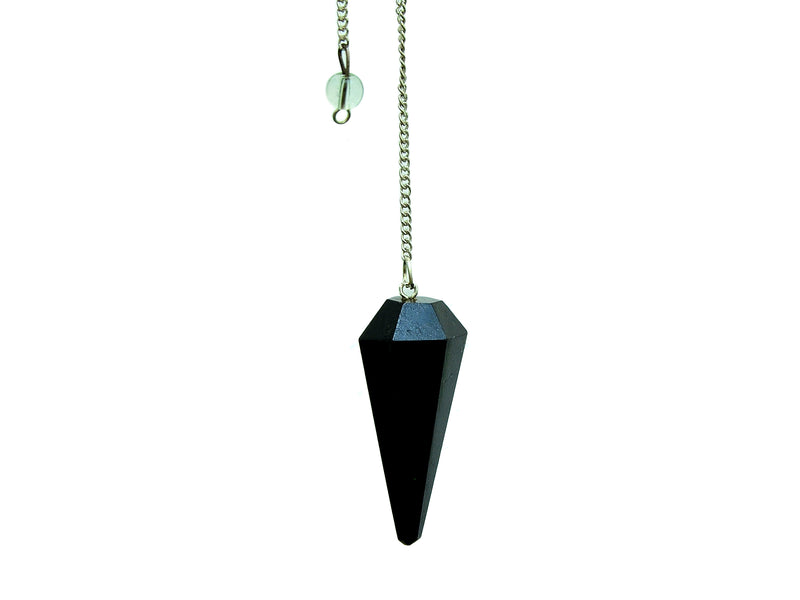 Black tourmaline crystal pendulum with silver chain on a white background
