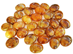 Several golden healer quartz palm stone crystals 50mm-65mm on white background