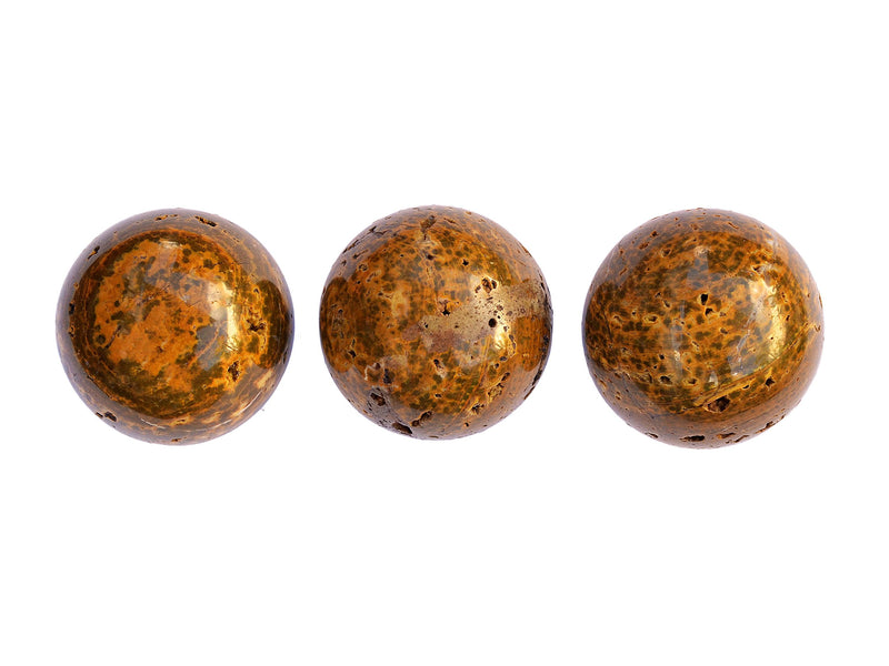 Three brown ocean jasper sphere crystal stones 55mm on white background