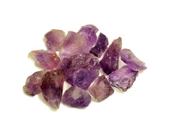 Some raw amethyst crystals 30mm-40mm on white background