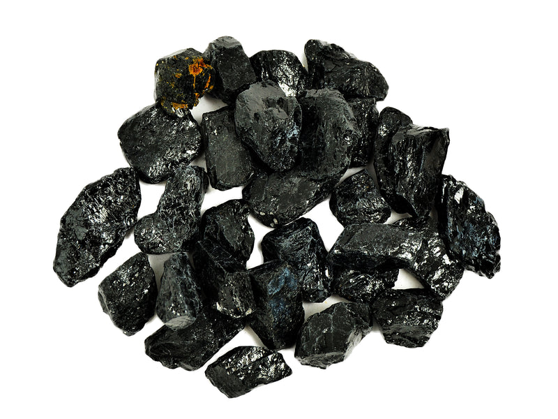 Some raw black tourmaline crystals 20mm-55mmm on white background