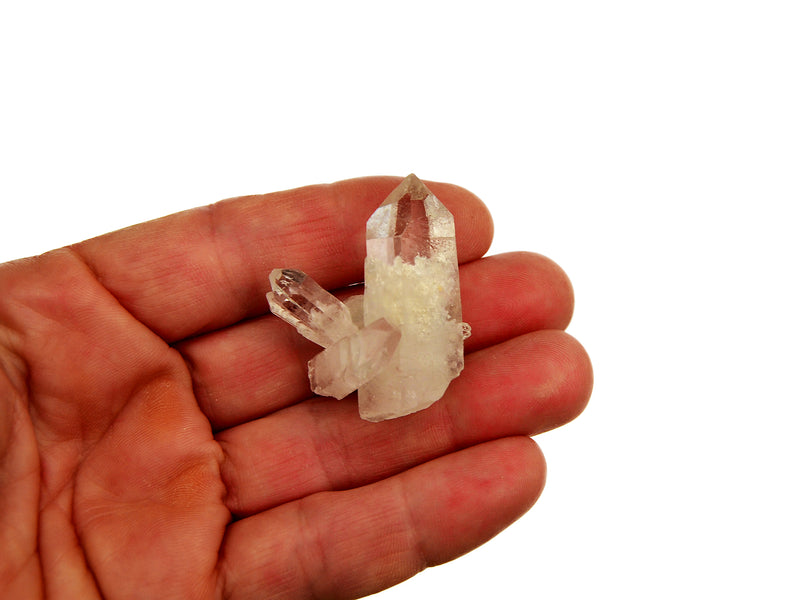 One mini clear quartz druzy 30mm on hand with white background