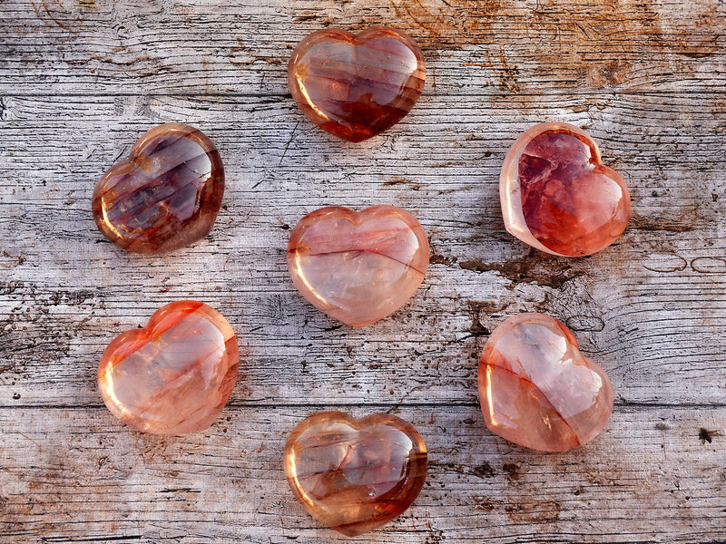 Somefire quartz crystal hearts 67mm forming a circle on wood table
