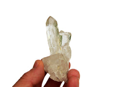 One mini clear quartz cluster 50mm on hand with white background