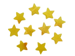 Several yelloc calcite star carved crystals 55mm on white background
