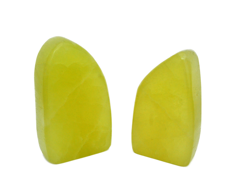 Two big lemon calcite free form stones 110mm-130mm on white background