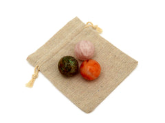 Carnelian, rose quartz and chrysocolla spheres 30mm on small bag