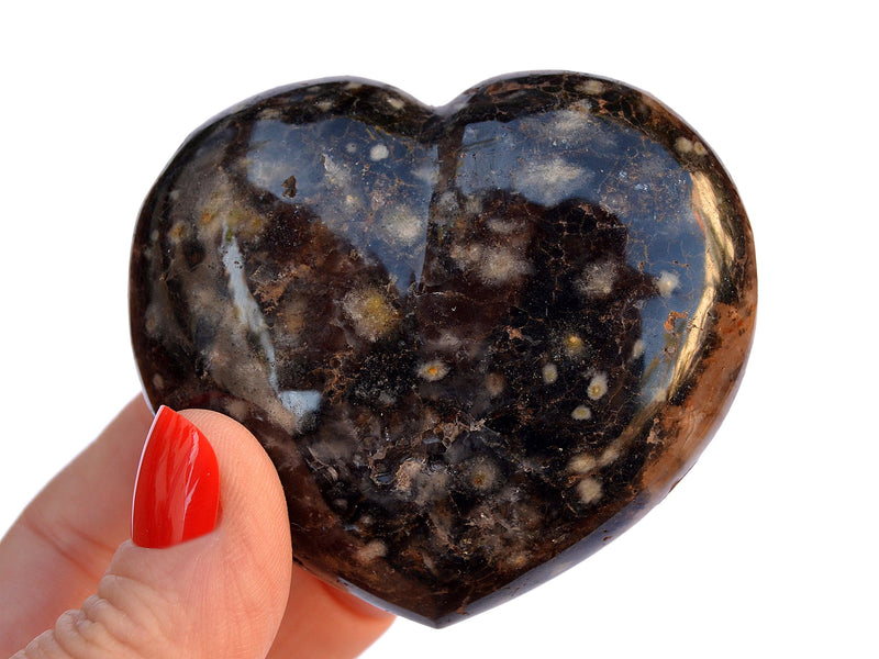 One big ocean jasper heart mineral 70mm on hand with white background