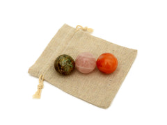Carnelian, rose quartz and chrysocolla spheres 30mm on a small jute bag
