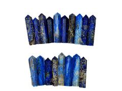 Several blue lapis lazuli small crystal points 40mm-50mm on white background